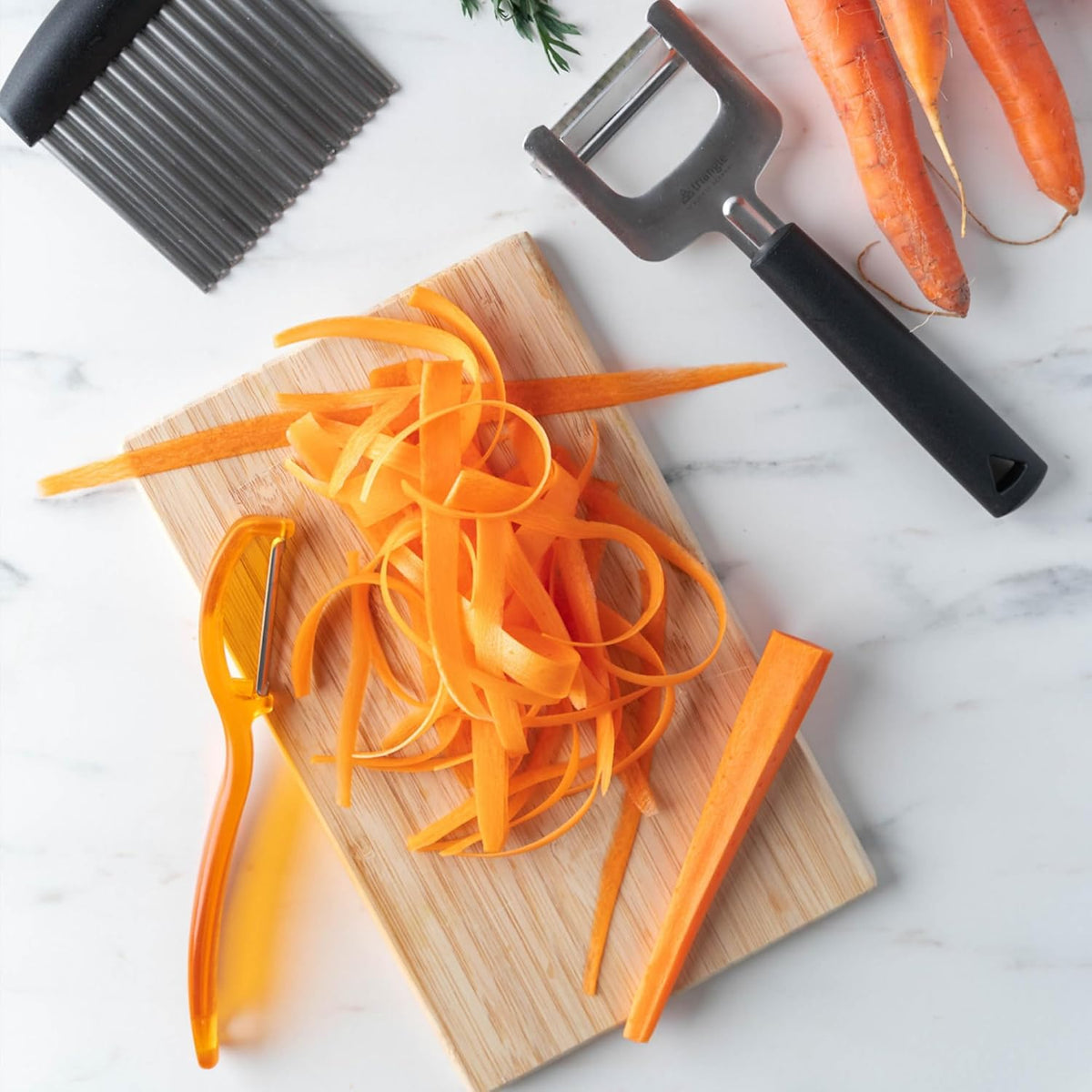 triangle Swivel Peeler, Orange - Stainless Steel Straight Twin Blade